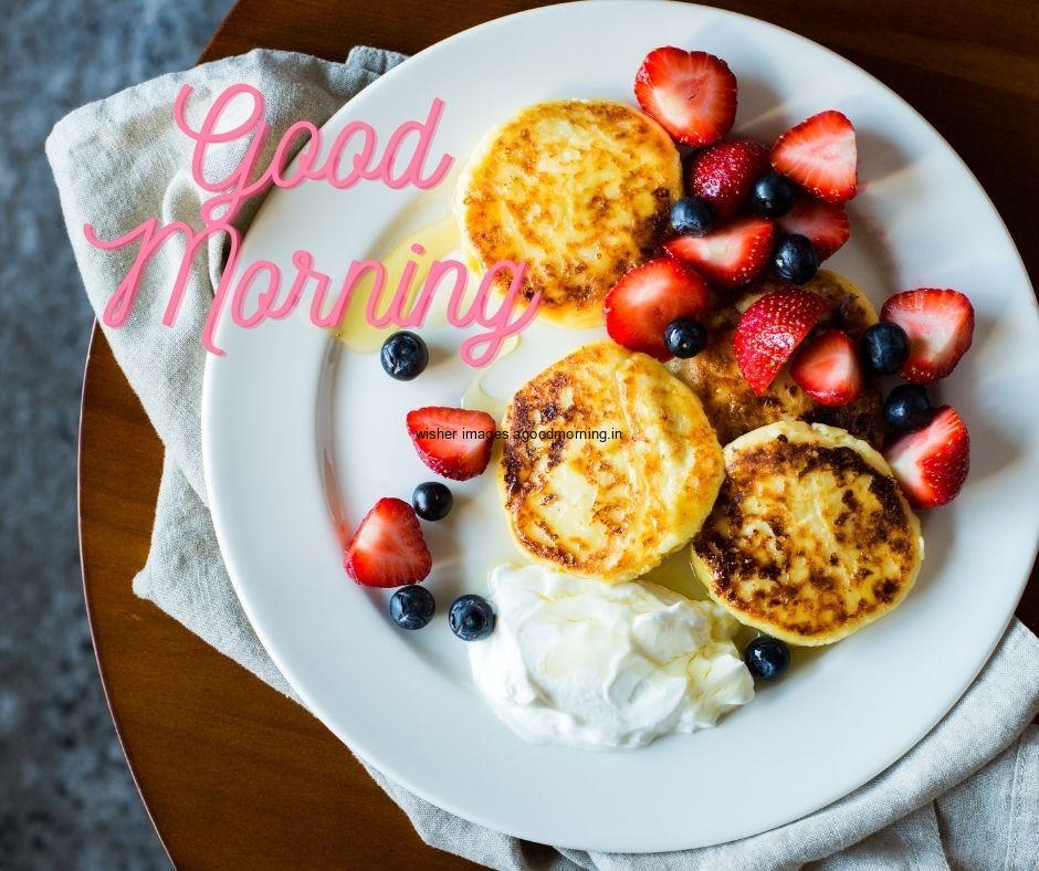 white plate with fruit on bread good moning quote with vegetable bowl in the bowl vegetable is placed