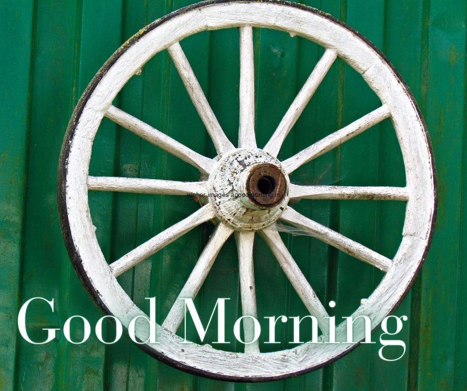 white wheel placed with good morning images quote with white text