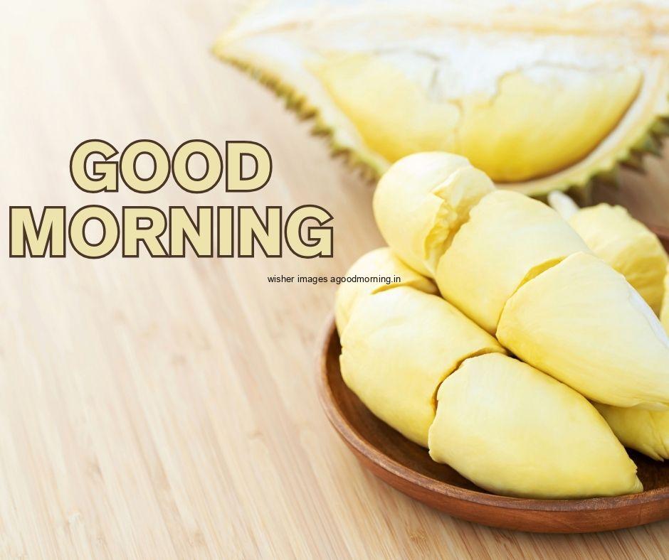 wooden background with banana good morning image text colour black with white border