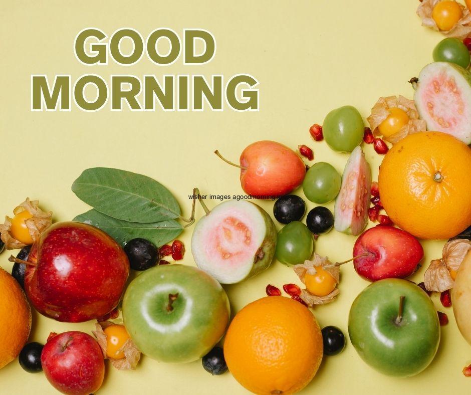 yellow with green background with orange, apple green apple grapefruit many fruit good morning image text colour yellow with white border