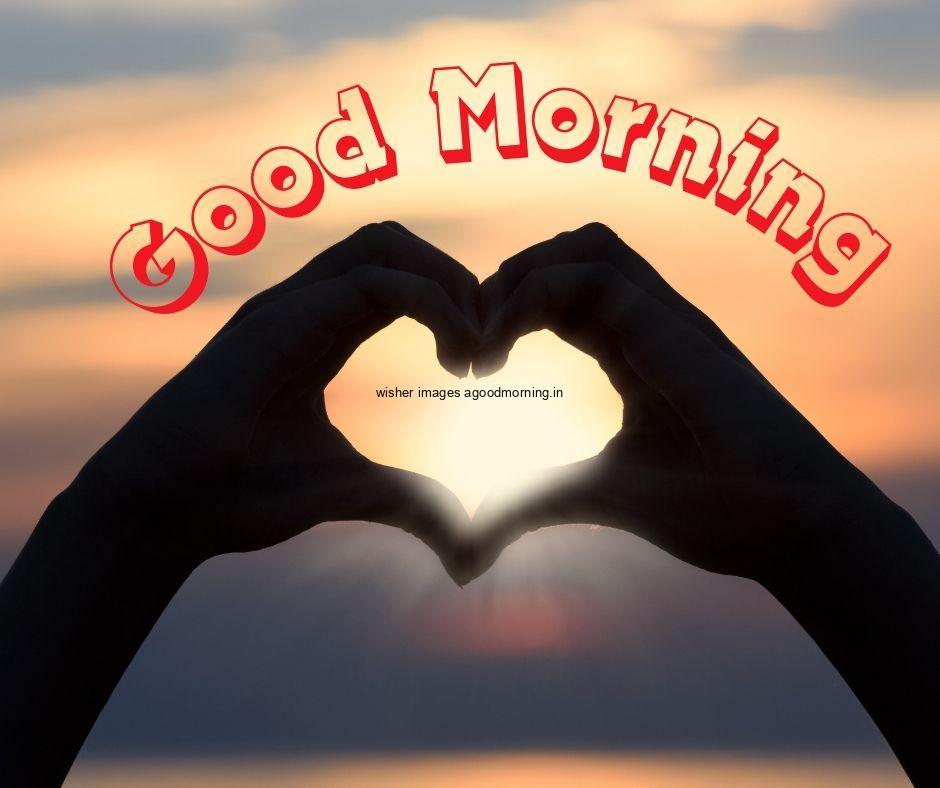 yellow-with-sun-light-background-with-hand-create-heart-shape-good-morning-image-red-text-placed HD 60+ Good Morning Images For download