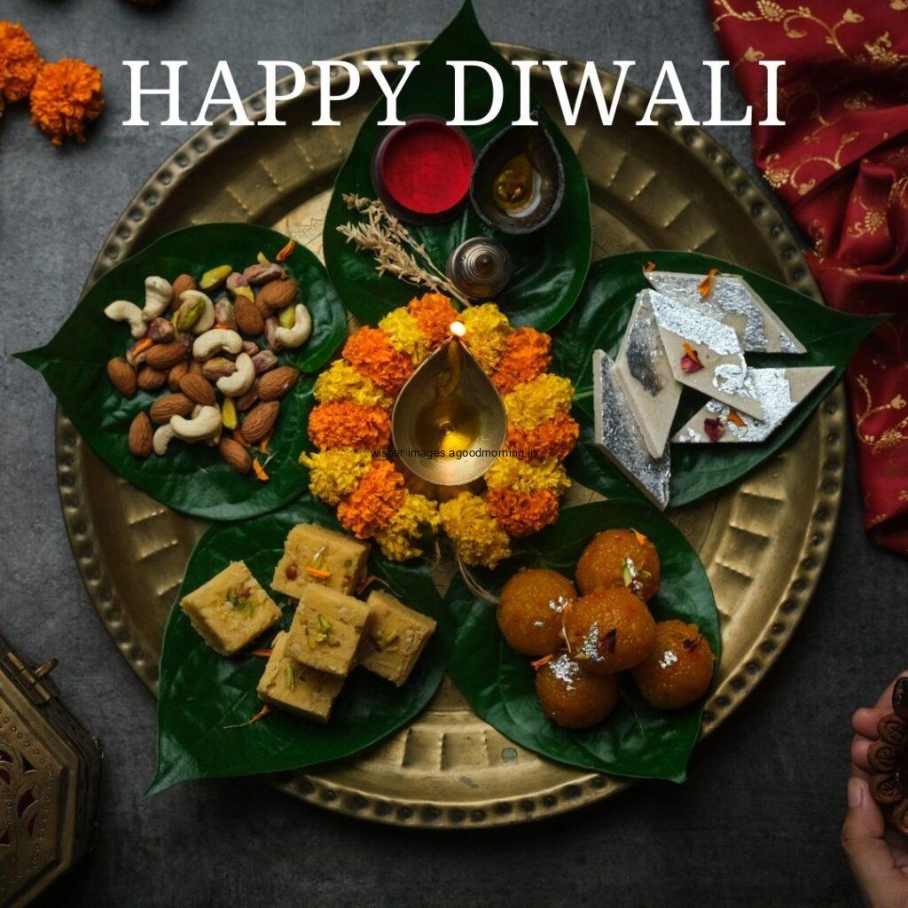 Beautiful plate makes plater with sweets with flowers grey background happy diwali image