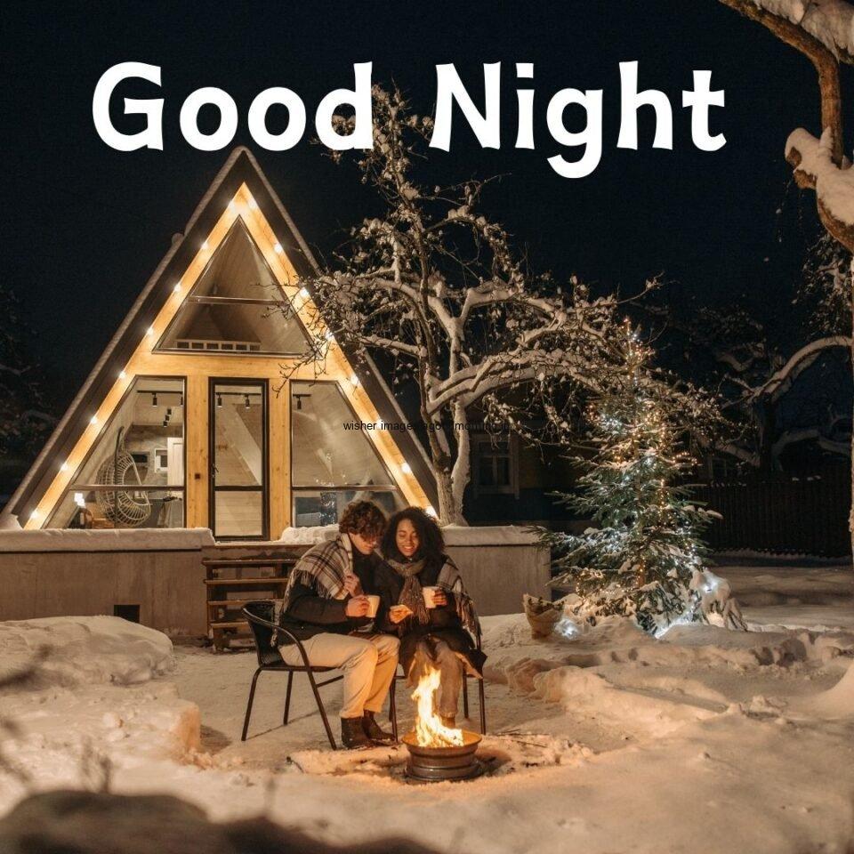 couople see eachother in the night out side the house beautifull background with good night placed on the top good night image