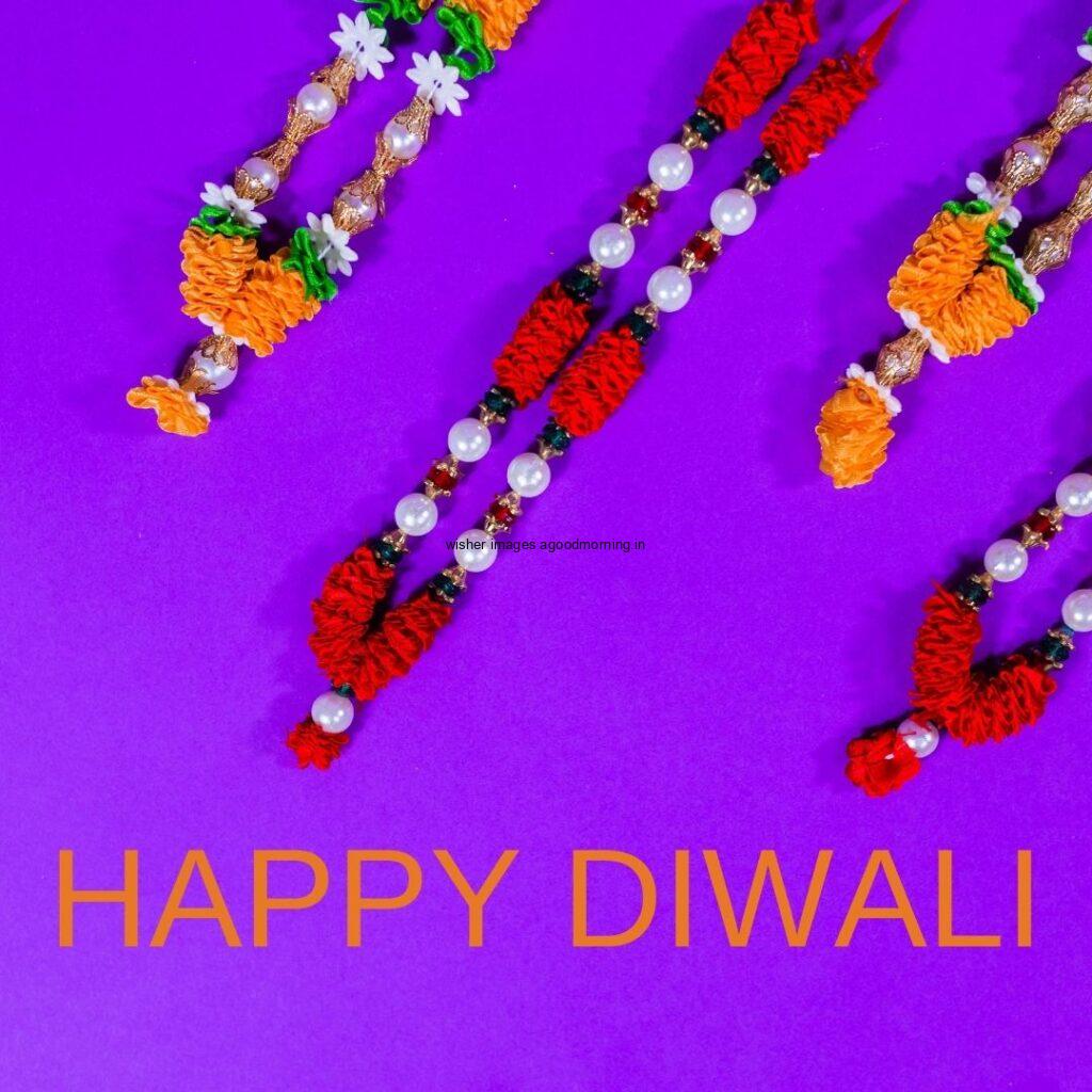 dark purple background with diya happy diwali