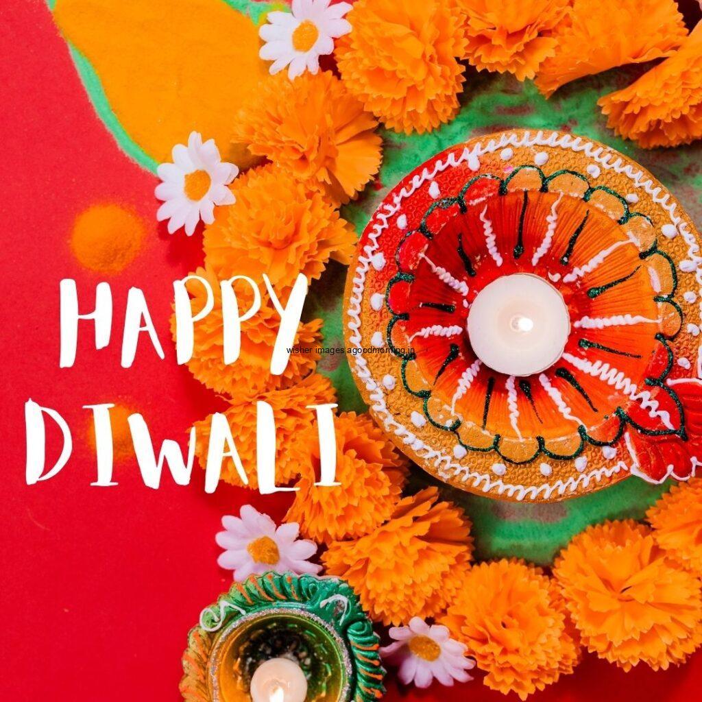 red background colourful diya with flowers happy diwali image