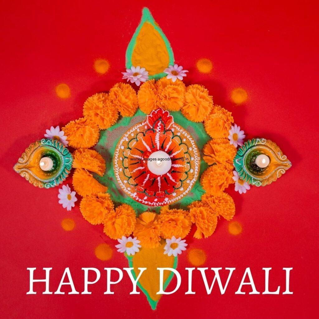 red background with colourful diya with flowers happy diwali image